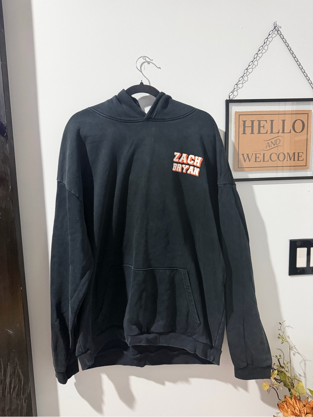 Zach Bryan Black Pullover Hoodie with Orange & White Chest Text